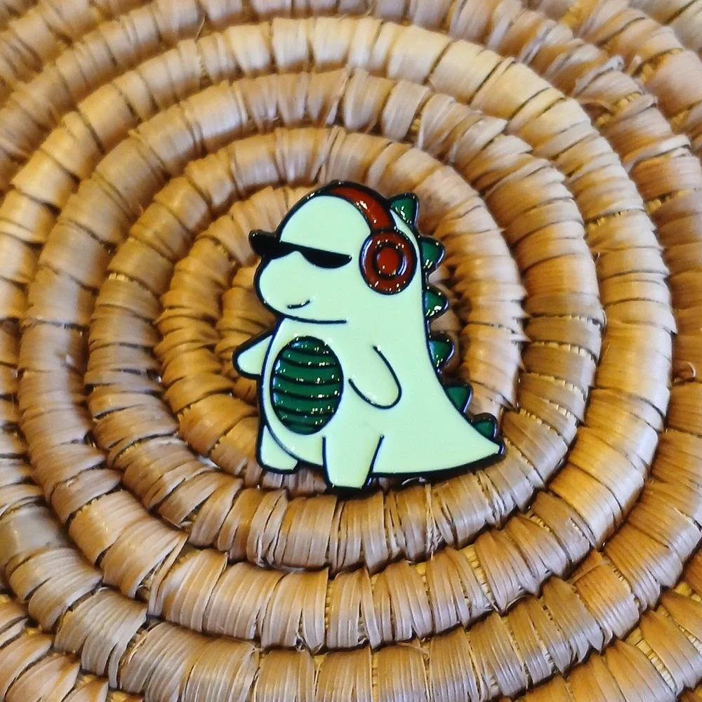 NEW Cartoon Dinosaur with Headphones Enamel Pin